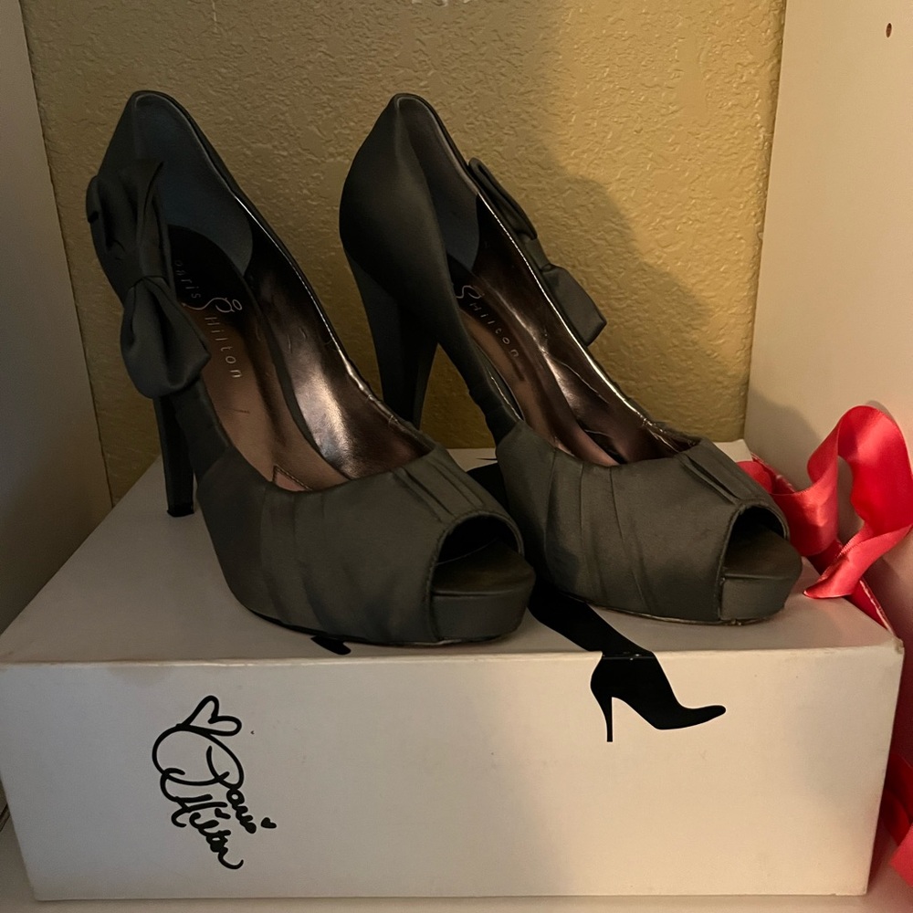 Gently used Paris Hilton grey heels. Includes original box. Size: 7.5